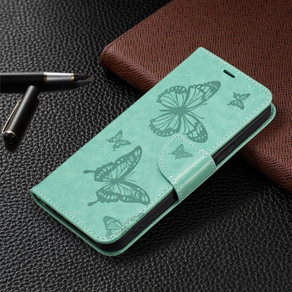 For iPhone 16 Embossing Two Butterflies Pattern Leather Phone Case(Green) - iPhone 16 Cases by PMC Jewellery | Online Shopping South Africa | PMC Jewellery | Buy Now Pay Later Mobicred