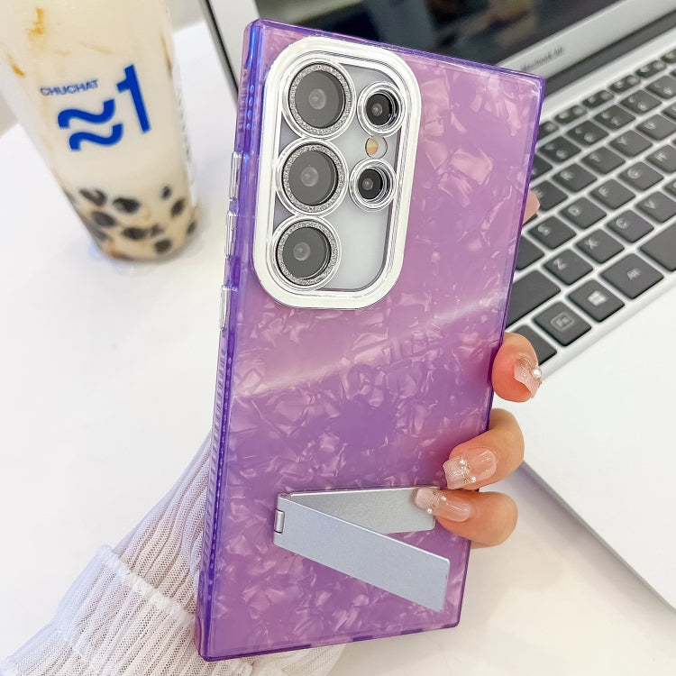 For Samsung Galaxy S25+ 5G Plating Glitter Texture Fold Holder TPU Phone Case with Lens Film(Purple Shell Pattern) - Galaxy S25+ 5G Cases by PMC Jewellery | Online Shopping South Africa | PMC Jewellery | Buy Now Pay Later Mobicred