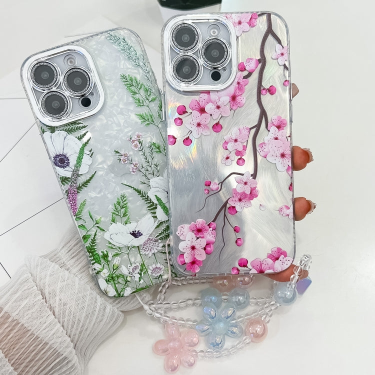 For iPhone 16e Electroplating Flowers Plants Texture Wristband TPU Phone Case(Gardenia FL15) - iPhone 16e Cases by PMC TechLife | Online Shopping South Africa | PMC TechLife | Buy Now Pay Later Mobicred